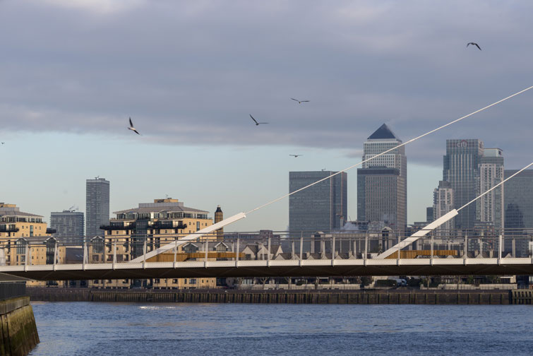 Cable stayed footbridge photographed against Docklands. 2 of 15.