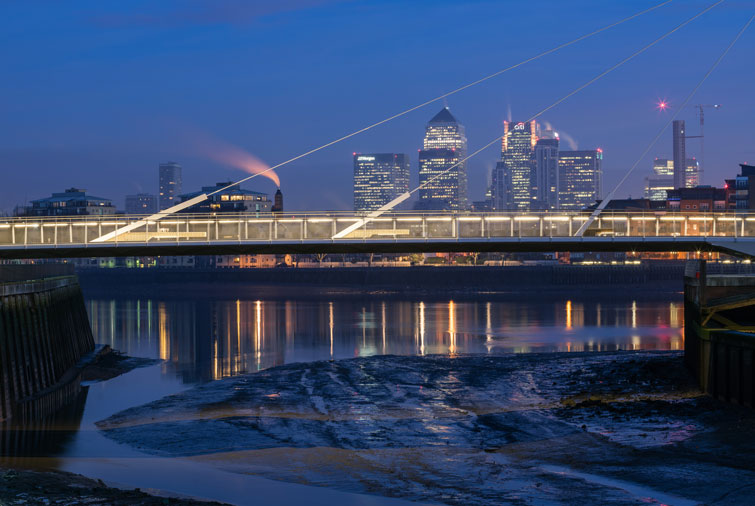 Illuminated bridge at low tide architectural photograph. 7 of 15.