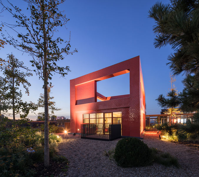 External lighting against red tile. 9 of 11.