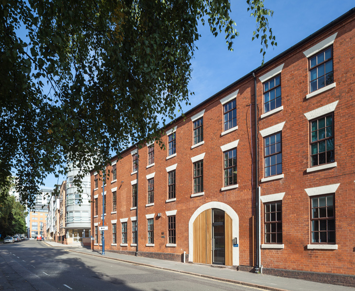 Exterior photograph showing the facade to the street, 01 of 14