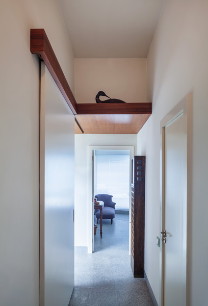 Interior showing sliding door and corridor, 02 of 11