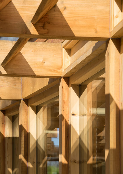 The structure shows extensive use of timber, 03 of 16