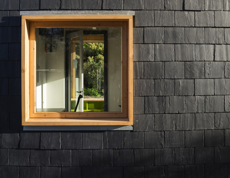 Exterior detail architectural photographer showing precisely hewn slate cladding, 07 of 16