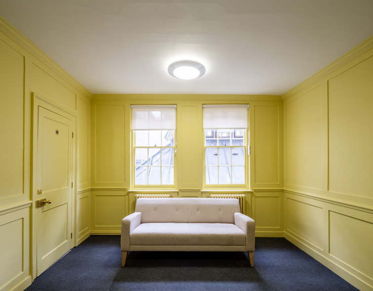 Interior showing yellow timber panels, 10 of 12