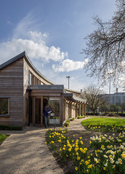 Exterior showing planting of daffodils, 12 of 16