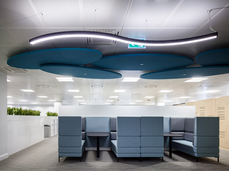 Seating area with booths and acoustic ceiling fixtures, 16 of 17