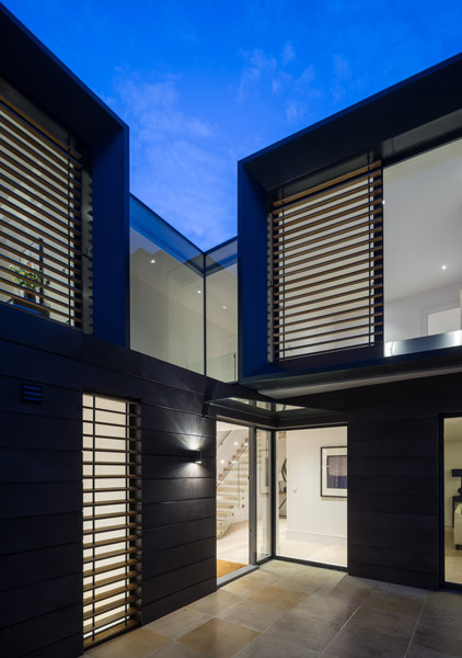 Night view of exterior showing external shading, 17 of 24