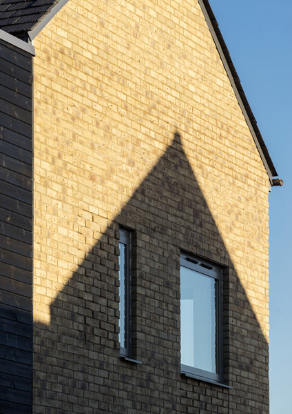Photograph describing how the shadows fall across the brick facade, 17 of 18