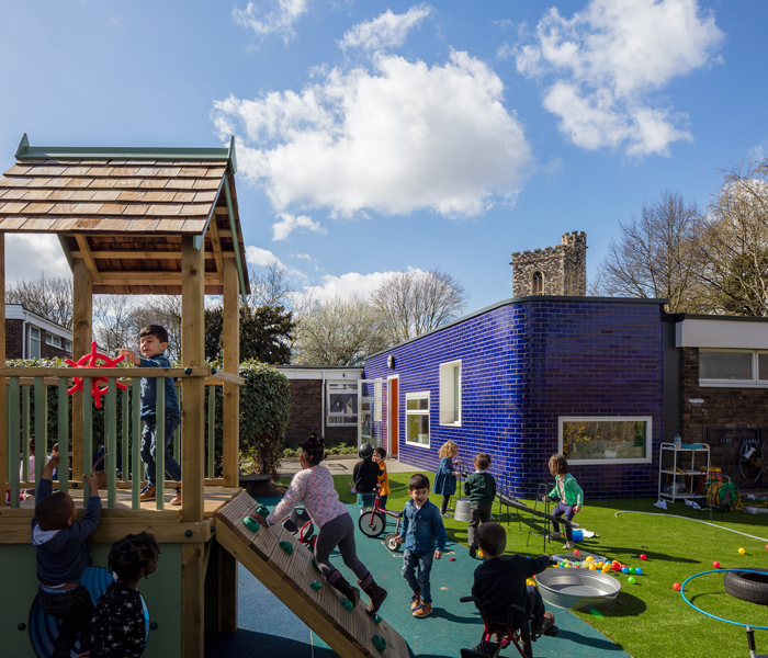 Playground architecture with new facade of glazed brick, 24 of 24